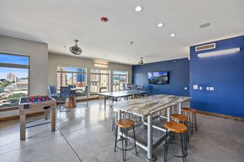 Hdtv lounge with billiards table and shuffle board